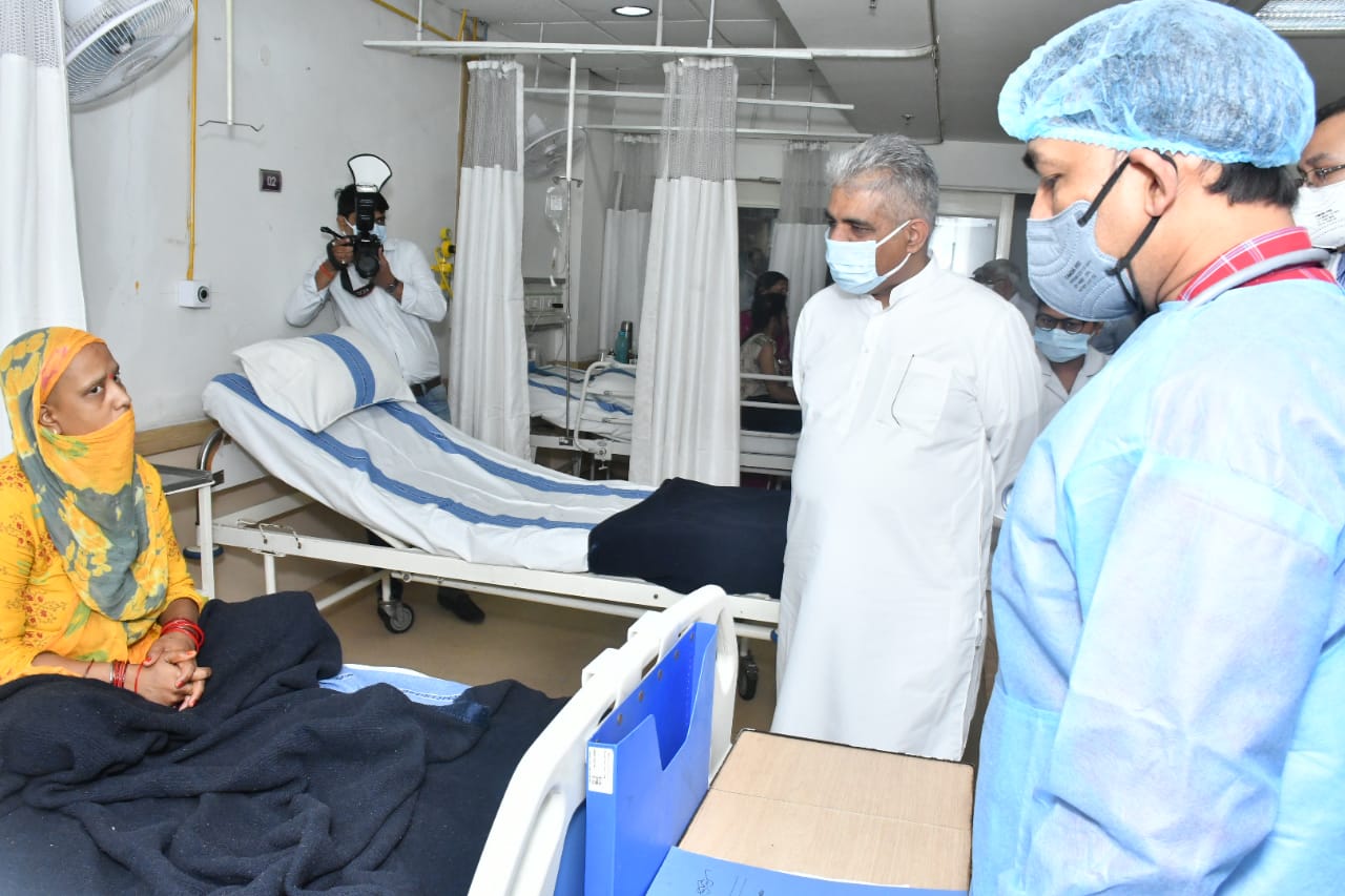 Sh. Bhuendra Yadav, Honourable Minister of Labour and Employment interacting with the female patients during health checkup camp.